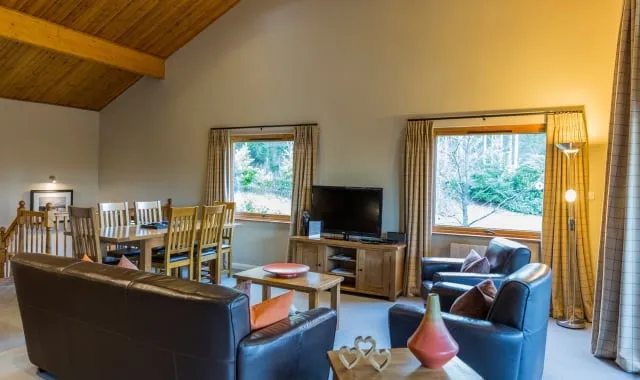 Living room area of the two bedroom Cameron House Lodge at Loch Lomond.