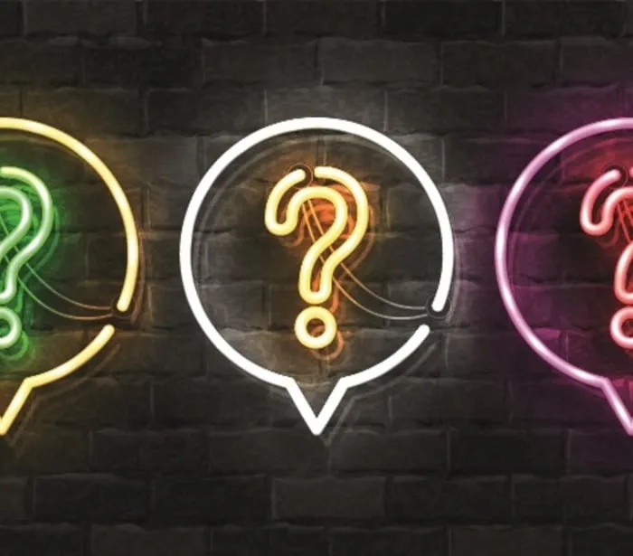 neon signs of a question mark