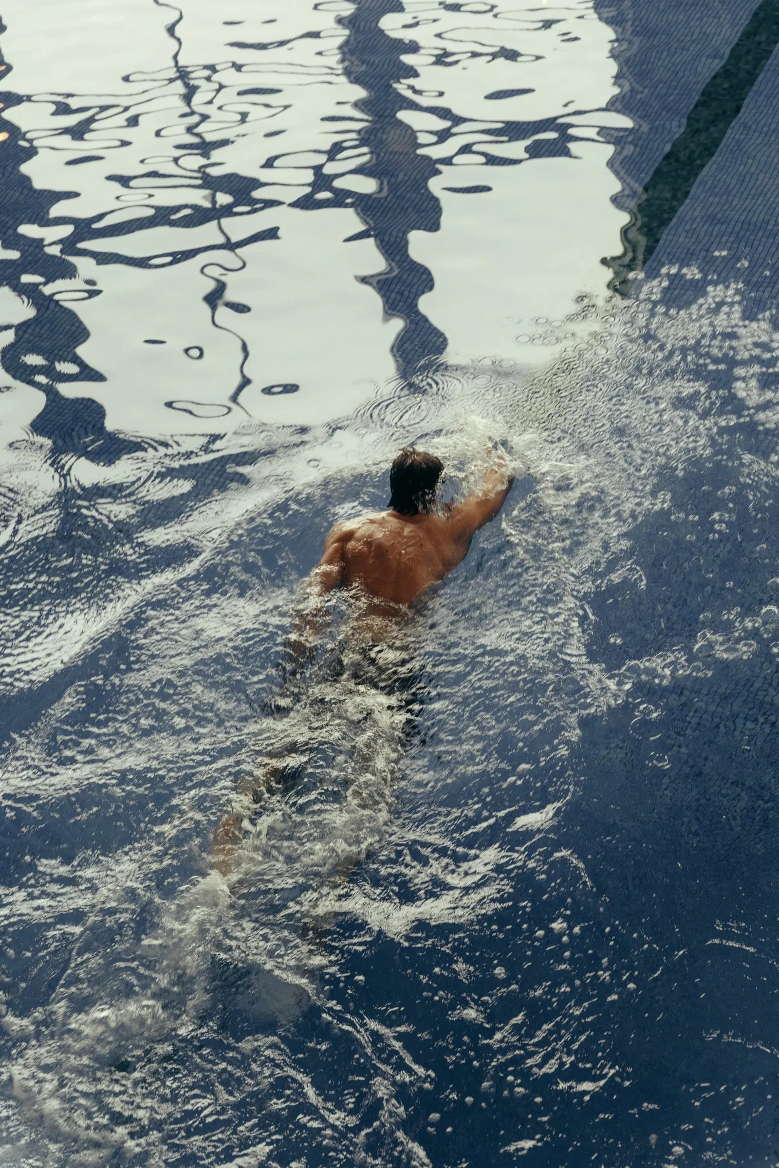 Person swimming lengths in the pool at the Cameron House Resort Health Club