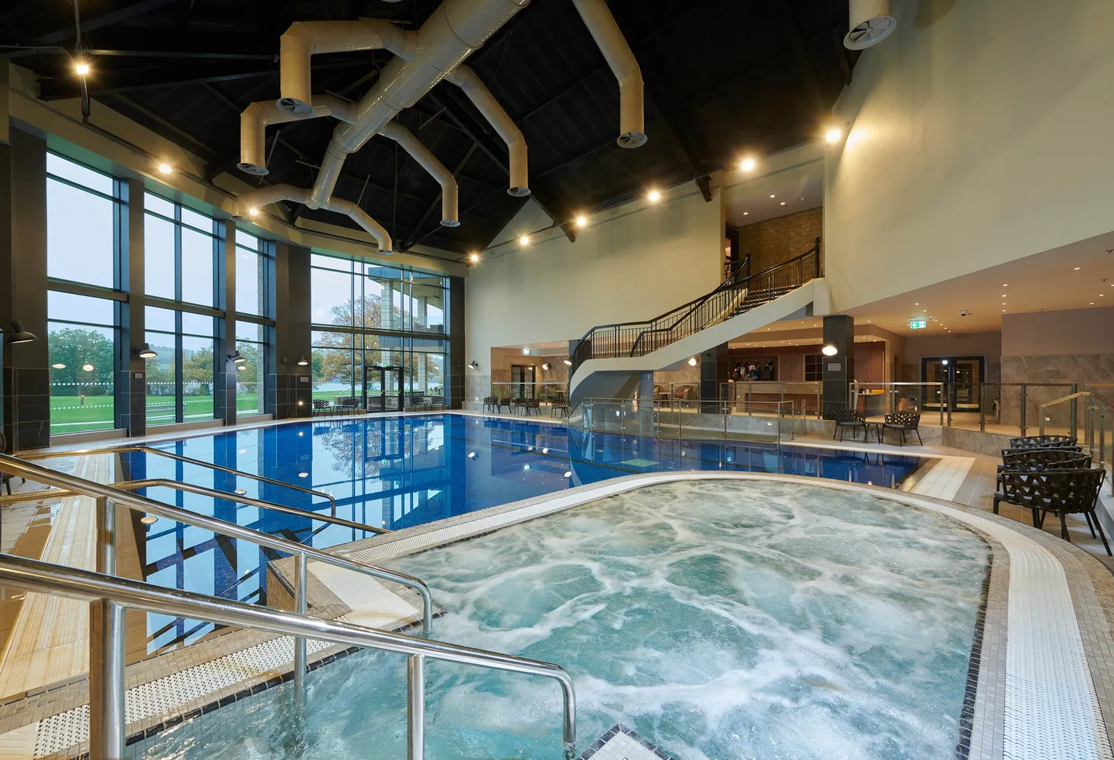 close up of in door whirl pool and another in door swimming pool